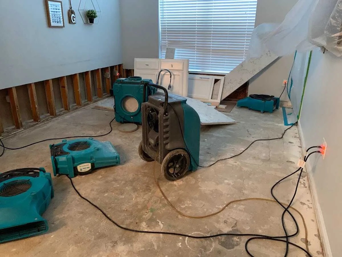 Dehumidifier in flood-cut room for Water Damage Restoration in Bellwood